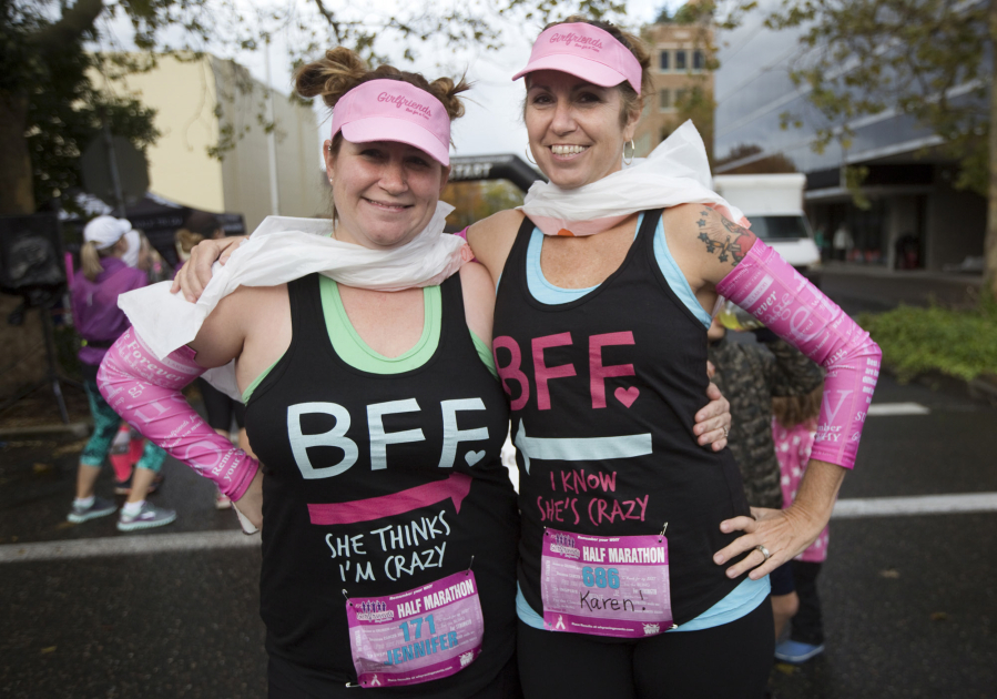 Best friends Jennifer Gorder and Karen Johnson take part in the annual Girlfriends Run for a Cure in Vancouver on Sunday. Johnson is a breast cancer survivor.