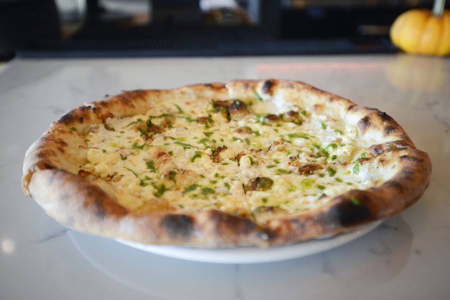 The Tocco di Verde pizza is served Oct. 11 at Rally Pizza in Vancouver.