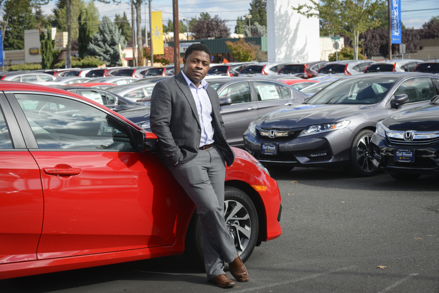 Milton Copeland, a sales manager at Dick Hannah Honda in Vancouver, during work in September.