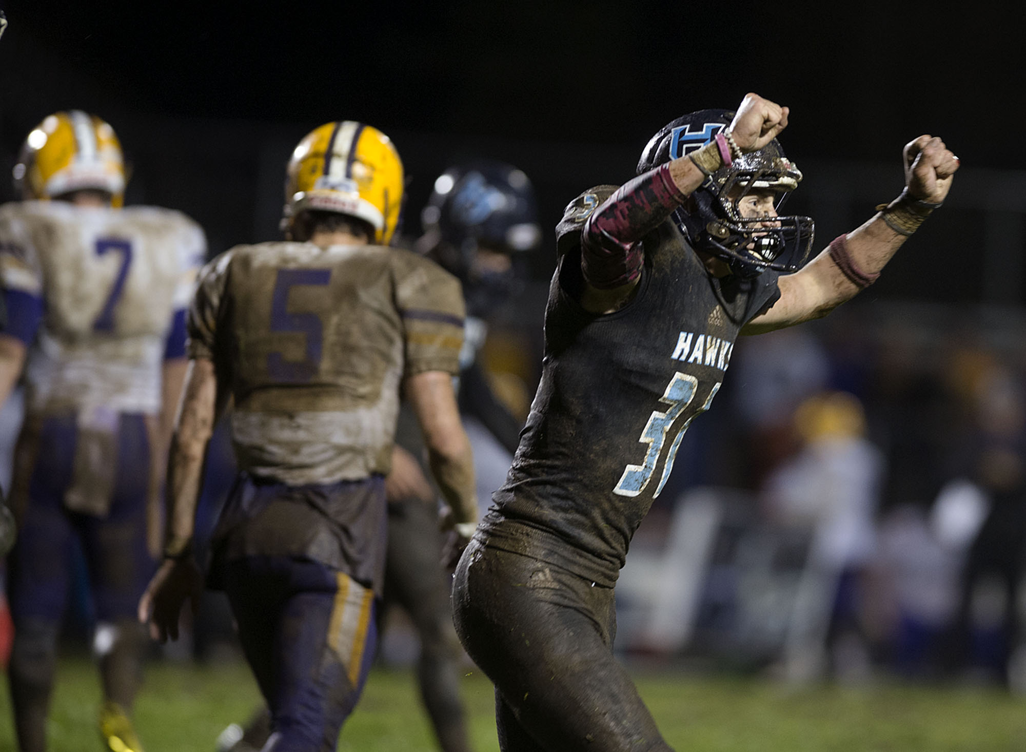 Hockinson's Wyatt Jones (31) celebrates after a Columbia River field goal attempt is no good in the third quarter at Hockinson High School on Friday night, Oct. 14, 2016.