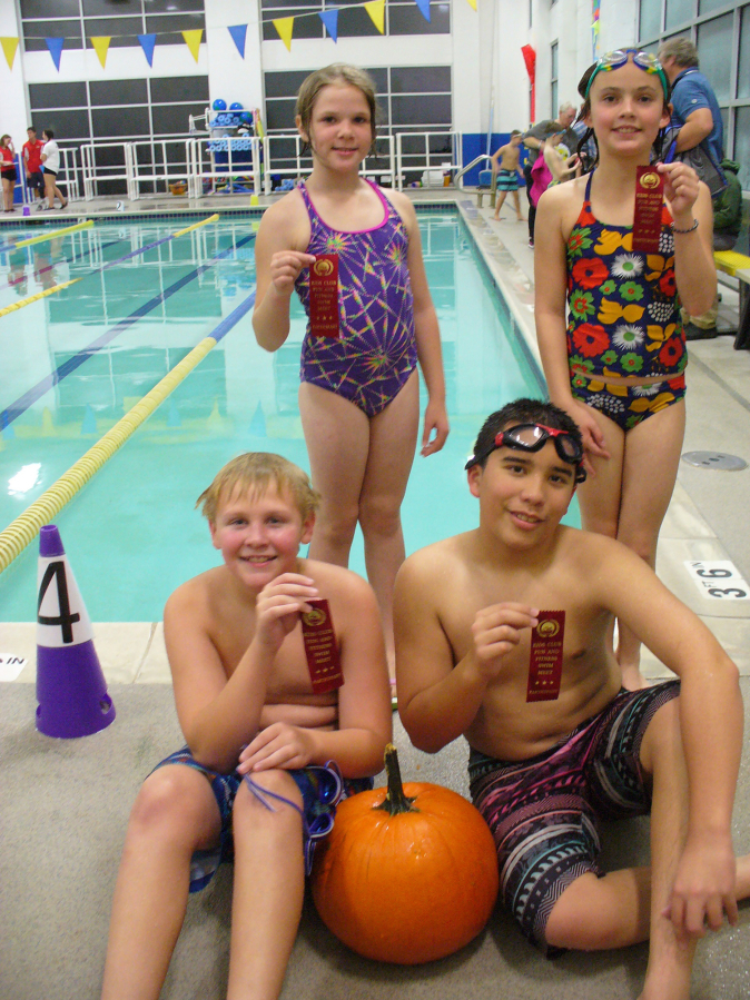 Green Meadows: At the Kids Club for Fun and Fitness Swim Meet, Green Meadows Swim Team members Jasmine Andrieu, back from left, and Berkeley McLean, Noah Schmidt, front from left, and Cody Mowery all earned medals.