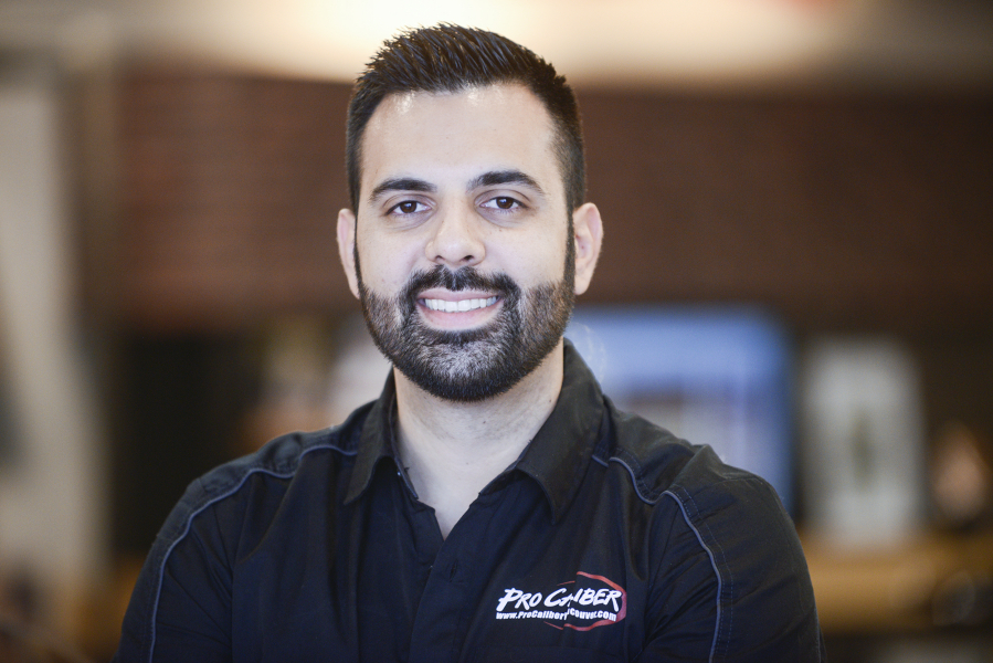 Asadour (Ozz) Demirjian takes a break from work at Pro Caliber Motorsports in Vancouver.