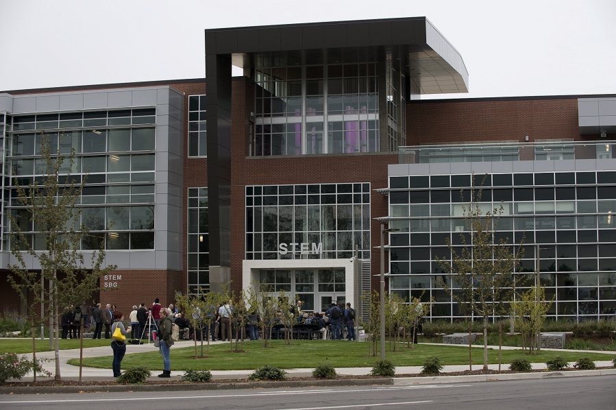 Visitors gather at Clark College&#039;s new STEM Building for a ribbon-cutting ceremony and a tour of the facility Monday afternoon. Students have been in classes at the 70,000-square-foot building for about two weeks, but it was formally unveiled to the public with a ribbon-cutting ceremony.
