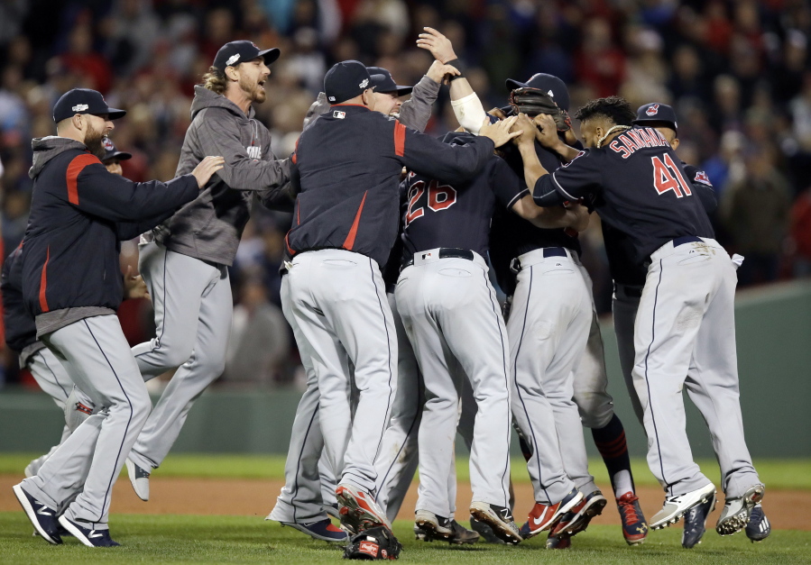 The Cleveland Indians celebrate their 4-3 win over the Boston Red Sox in Game 3 of baseball&#039;s American League Division Series, Monday, Oct. 10, 2016, in Boston.