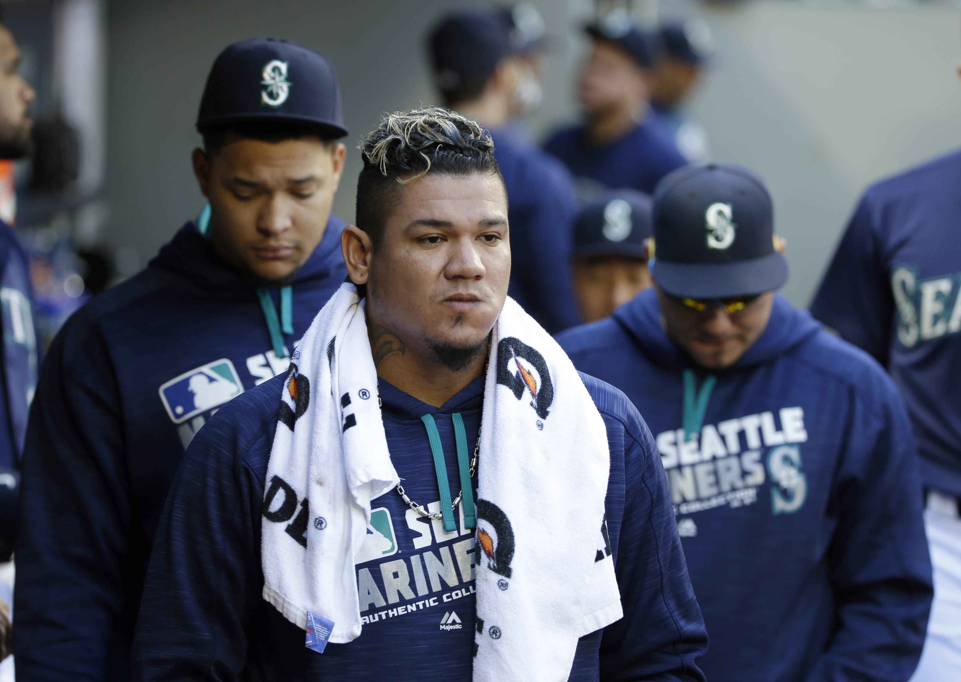 Seattle Mariners starting pitcher Felix Hernandez walks in the dugout during the fifth inning of a baseball game against the Oakland Athletics, Sunday, Oct. 2, 2016, in Seattle. (AP Photo/Ted S.