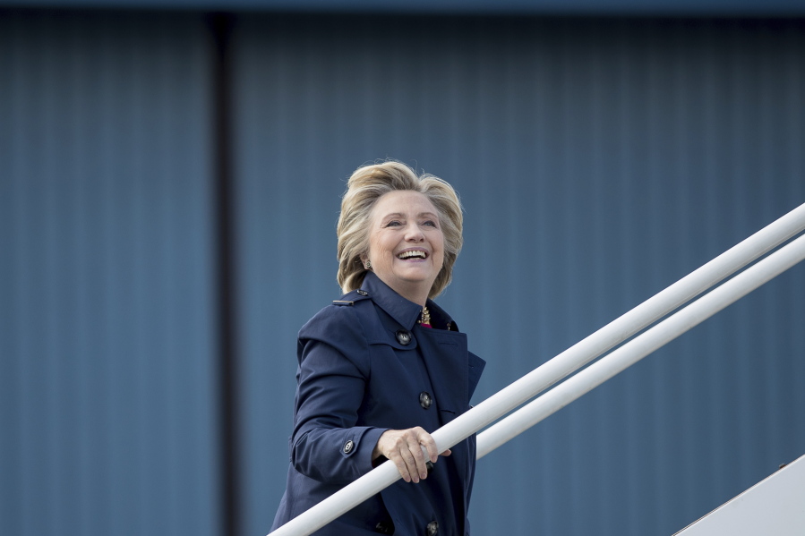 Democratic presidential candidate Hillary Clinton boards her campaign plane in White Plains, N.Y., on Tuesday to travel to Philadelphia. Clinton is scheduled to attend rallies in Haverford, Pa. and Harrisburg, Pa.