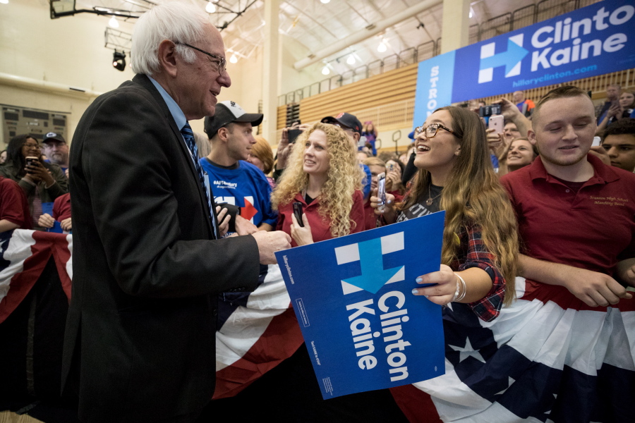 Scarlett Spager, 16, of Old Forge, Pa., smiles as she meets Sen. Bernie Sanders, I-VT, following a rally in support of Hillary Clinton and U.S. Senate candidate Katie McGinty at Scranton High School in Scranton, Pa. on Saturday.