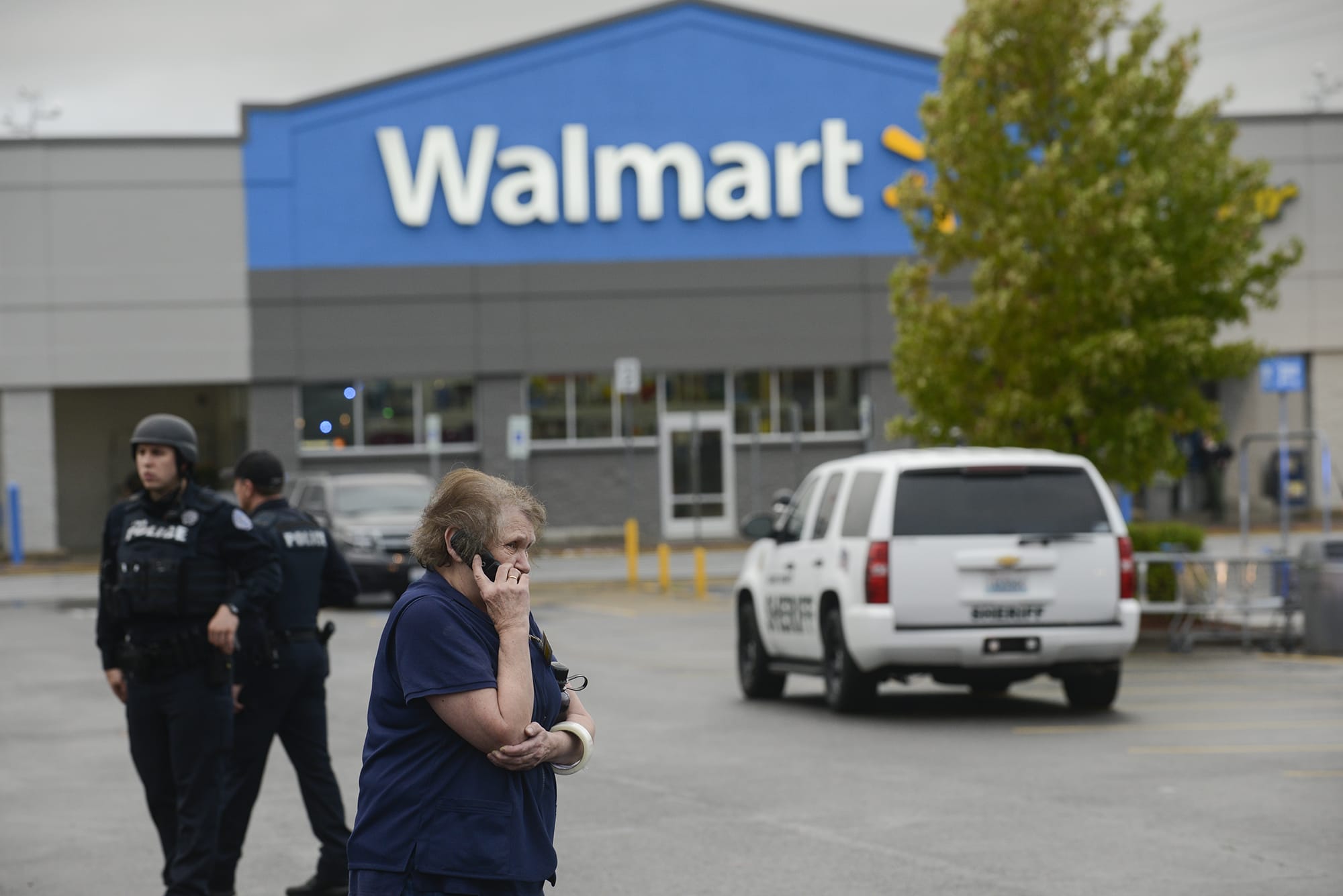 Police investigate a shooting at the Hazel Dell Wal-Mart on Wednesday.