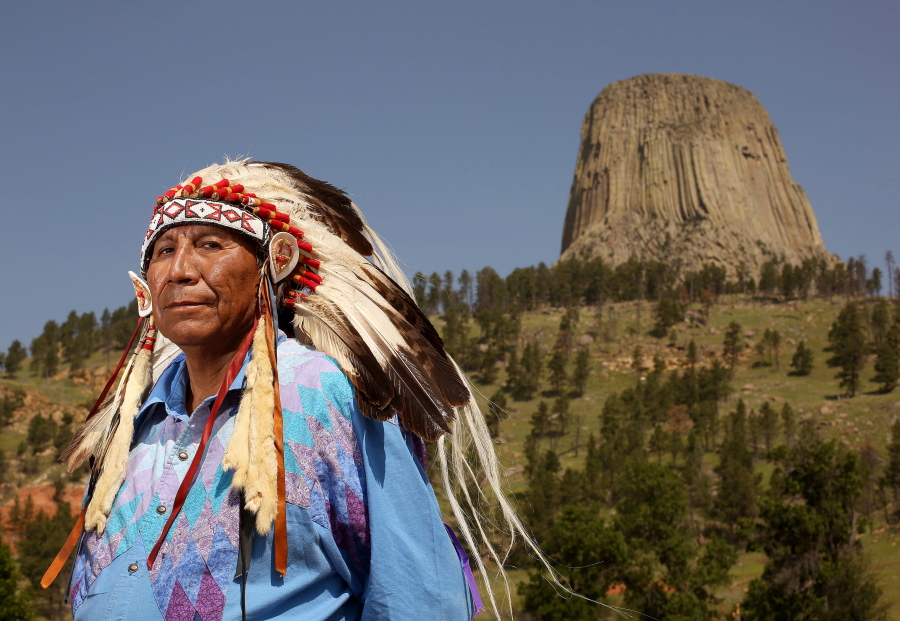 Chief Arvol Looking Horse, spiritual leader of the Great Sioux Nation, posing for a portrait in front of Devils Tower National Monument in Devils Tower, Wyo on Thursday, July 9, 2015. Looking Horse has petitioned to change the name of the geologic feature to Bear Lodge.