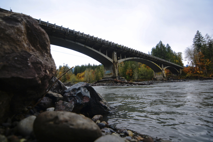 U.S. Highway 101 bridge spans the Elwha River west of Port Angeles. The Washington State Department of Transportation is exploring options for the bridge, as the now-wild river continues to eat away at the riverbed under the structure.