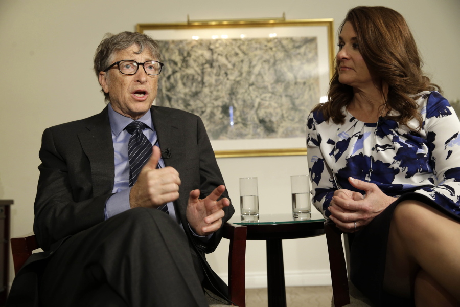 Bill and Melinda Gates talk to reporters in New York.