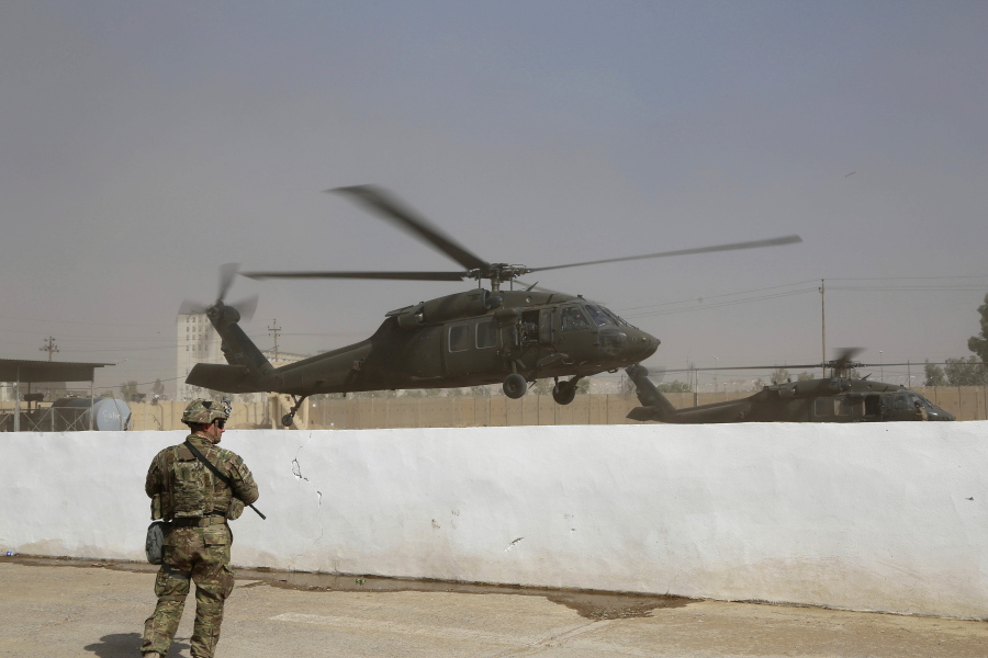 A helicopter belonging to the international coalition forces takes off from a base outside Mosul, Iraq, on Wednesday. The U.S. has just as much to gain from the operation to recapture Mosul as the Iraqis themselves. Since 2014, the U.S. has provided airstrikes and advise-and-assist operations to put the beleaguered Iraqi military back on its feet after the Islamic State group gutted it of weapons, supplies and soldiers during its blitzkrieg across Iraq and Syria.