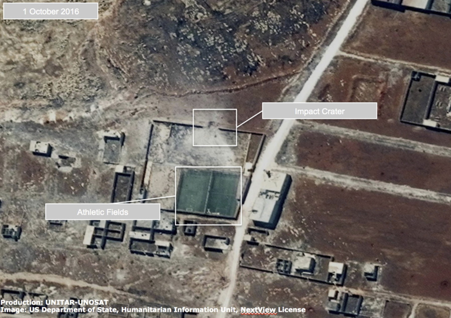 This satellite image released by the United Nations, shows a damaged school or athletic facility in the Owaija district of Aleppo, Syria, on Oct. 1. One official with the U.N.&#039;s satellite imagery program says new pictures from rebel-held parts areas of the city show &quot;an awful lot of new damage&quot; _ presumably by airstrikes. The release coincides with a stepped-up offensive by Syrian pro-government forces that are attacking the city from the south in a bid to penetrate its opposition-controlled areas, where the U.N. estimates 275,000 people are trapped in a government siege.