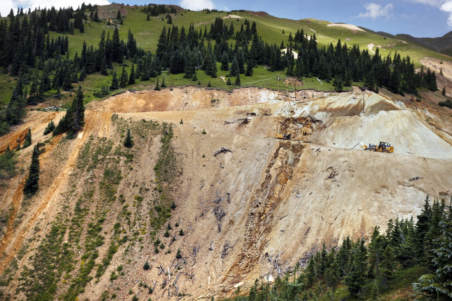 FILE - In this Aug. 12, 2015, file photo, Environmental Protection Agency contractors repair damage at the site of the Gold King mine spill of toxic wastewater, outside Silverton, Colo. U.S. prosecutors have declined to pursue criminal charges against an employee of the EPA over a massive mine wastewater spill that fouled rivers in three states, a federal watchdog agency said. The EPA&#039;s Office of Inspector General disclosed Wednesday, Oct. 12, 2016, that it recently presented evidence to prosecutors that the unnamed employee may have violated the Clean Water Act and given false statements.