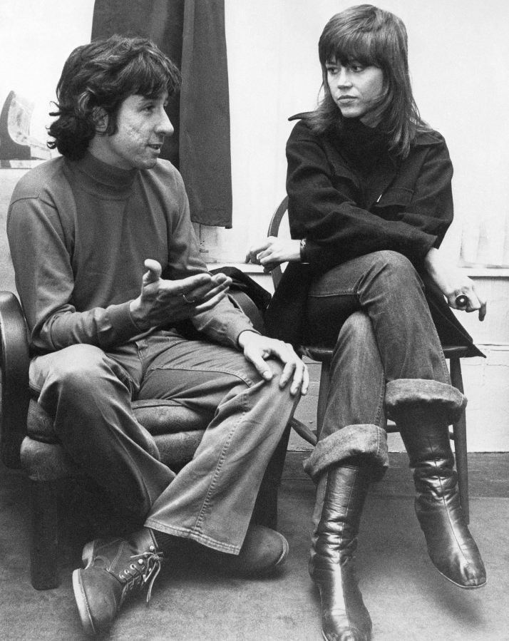 Tom Hayden, one of the founders of SDS, and actress Jane Fonda talk at the home of a friend in London on Dec. 26, 1972, after their arrival from Paris. Hayden, the famed 1960s anti-war activist who moved beyond his notoriety as a Chicago 7 defendant to become a California legislator, author and lecturer, has died. He was 76.