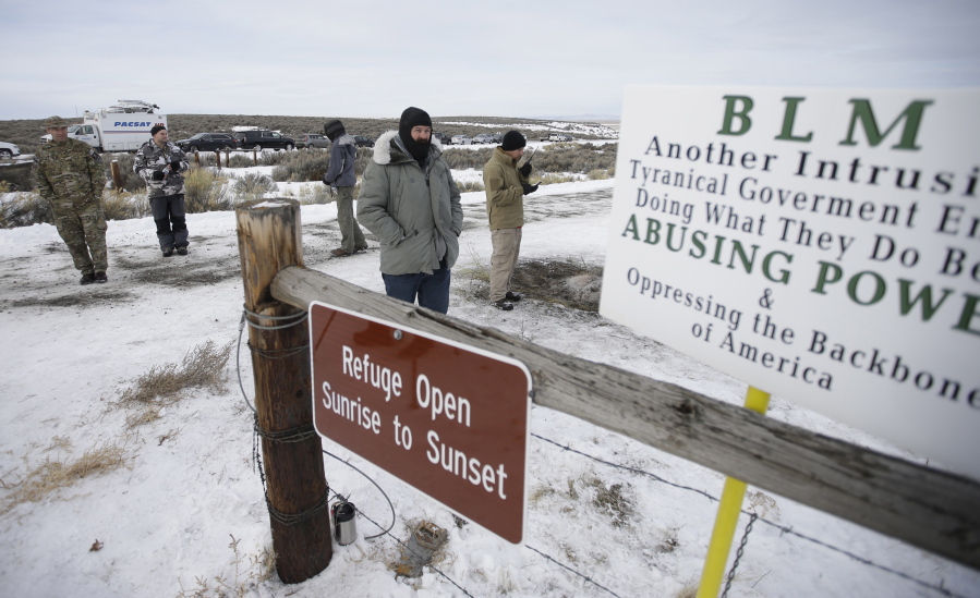 Members of the group occupying the Malheur National Wildlife Refuge headquarters stand guard near Burns, Ore., in January. The leaders of an armed group that took over a national wildlife refuge in rural Oregon have been found not guilty of conspiracy and possession of firearms at a federal facility. A jury on Thursday exonerated brothers Ammon and Ryan Bundy and five others of conspiring to impede federal workers from their jobs at the Malheur National Wildlife Refuge.