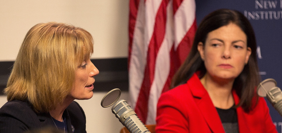 Candidates for U.S. Senate, Democrat Gov. Maggie Hassan, left and incumbent Republican Sen. Kelly Ayotte attend a forum with business leaders Tuesday in Manchester, N.H.