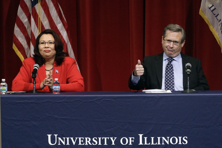 Republican U.S. Sen. Mark Kirk, right, and Democratic U.S. Rep. Tammy Duckworth, left, face off in their first televised debate in what&#039;s considered a crucial race that could determine which party controls the Senate on Thursday at the University of Illinois in Springfield, Ill.