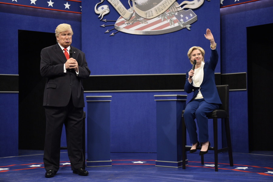 Alec Baldwin, left, as Republican presidential candidate Donald Trump, and Kate McKinnon, as Democratic presidential candidate Hillary Clinton, perform Oct.