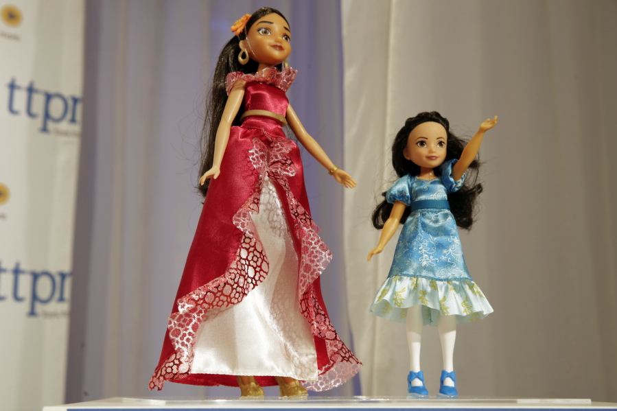 Elena of Avalor, left, and Princess Isabel, from The Disney Store, are on display Oct. 6 at the annual TTPM Holiday Showcase, in New York. Toy companies are offering products that are more inclusive, from Barbie dolls in all shapes, sizes and skin tones to baby dolls aimed at boys.