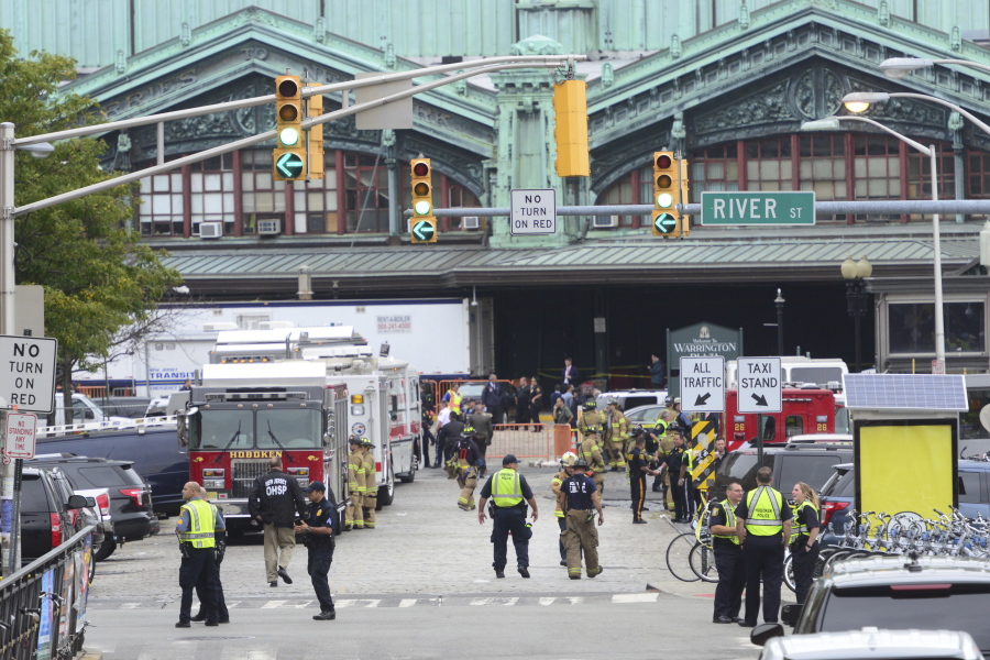 Emergency personnel respond to a train crash in the Hoboken train station Sept. 29 in Hoboken, N.J.