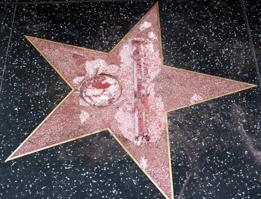 The vandalized star for Republican presidential candidate Donald Trump is seen on the Hollywood Walk of Fame in Los Angeles. Detective Meghan Aguilar said investigators were called to the scene before dawn Wednesday following reports that Trump&#039;s star was destroyed by blows from a hammer.