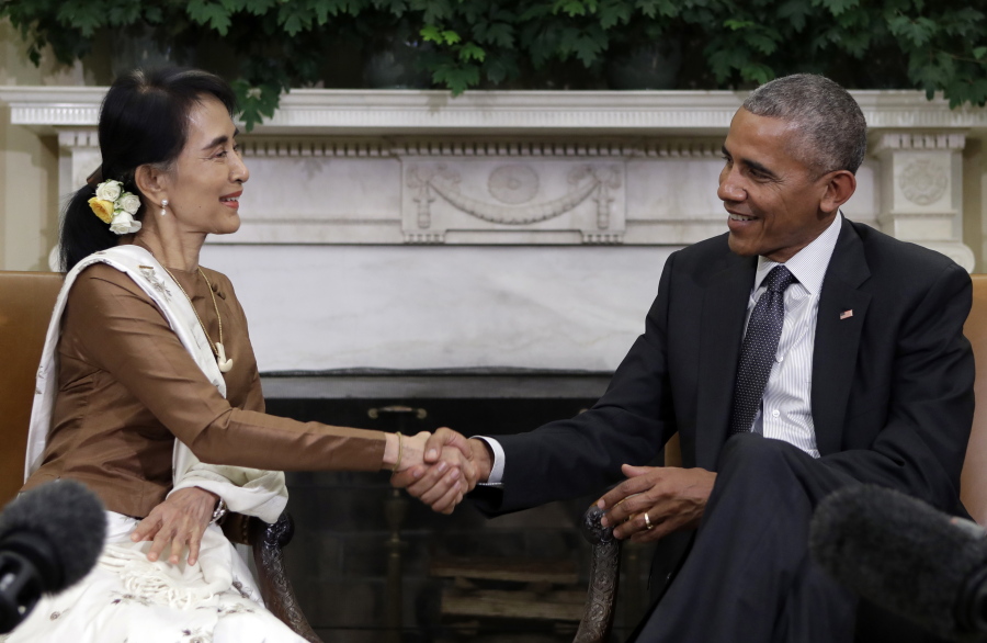 FILE - In this Sept. 14, 2016, file photo, President Barack Obama and Myanmar&#039;s leader Aung San Suu Kyi shake hands as they speak to media at the conclusion of a meeting in the Oval Office of the White House in Washington. Obama on Oct. 7 lifted U.S. economic sanctions on the former pariah state of Myanmar, the culmination of years of rapprochement that Obama has worked to facilitate. The Southeast Asian nation, also known as Burma, has pursued political reforms over the last five years following decades of oppressive military rule.