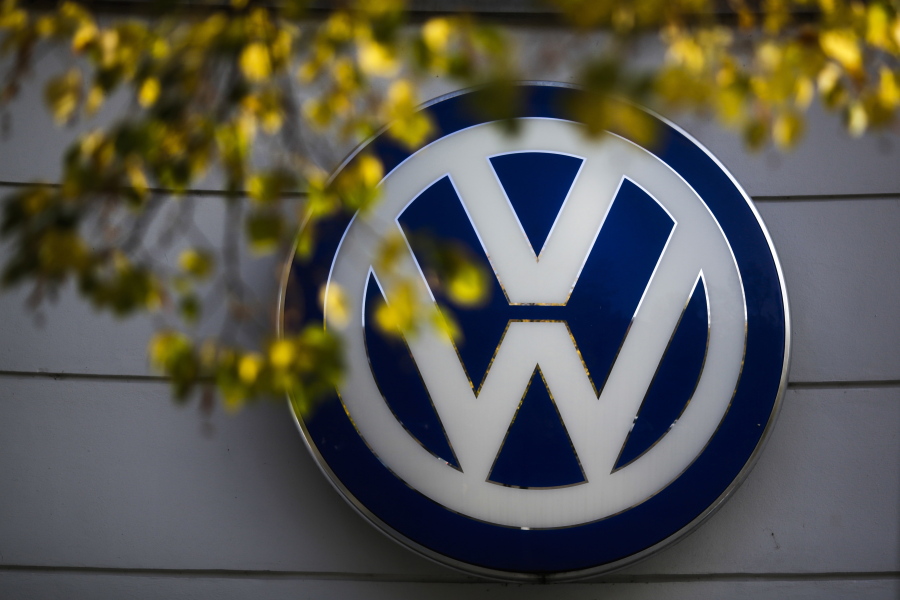 The sign of Germany&#039;s Volkswagen car company is displayed at the building of a company&#039;s retailer in Berlin.