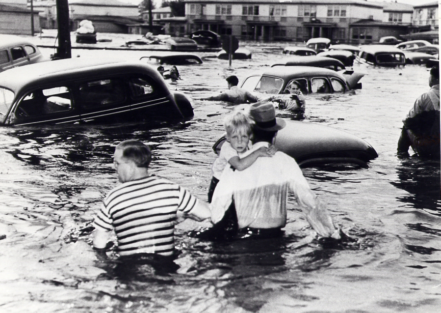 A boy clings to safety at Entrance Circle on May 30, 1948, during the Vanport flood, where Portland&#039;s Delta Park is today. Seventy years after the flood washed it away, Vanport is having something of a comeback. In February 2015, the Smithsonian Magazine published a long piece about the city&#039;s disappearance. The Oregon Historical Society&#039;s current exhibit features Vanport, too.