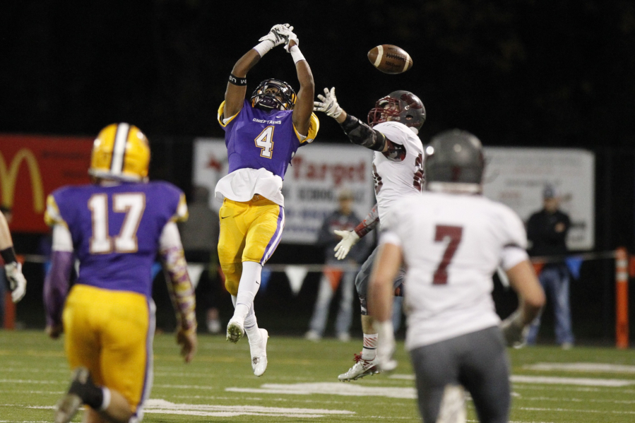 Columbia River defensive back Nathaniel Trevino (4) breaks up a pass against WF West at Higgins Bowl.