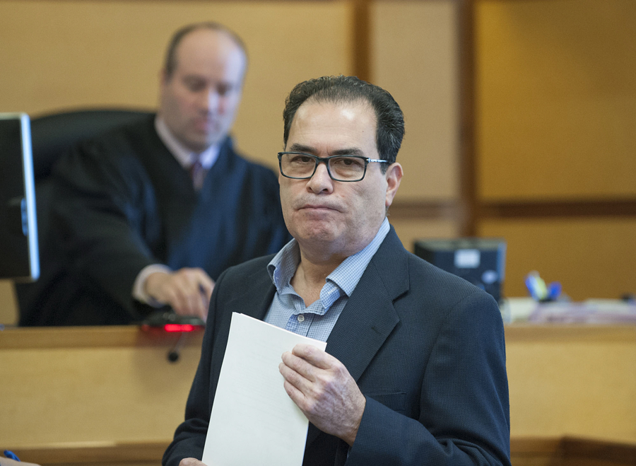 Armando Sosa Perez, the former priest at Vancouver's St. John the Evangelist Catholic Church, appears in court while changing his plea Sept. 15. Perez pleaded guilty to three counts of first-degree theft and was sentenced Thursday to 40 days in jail.