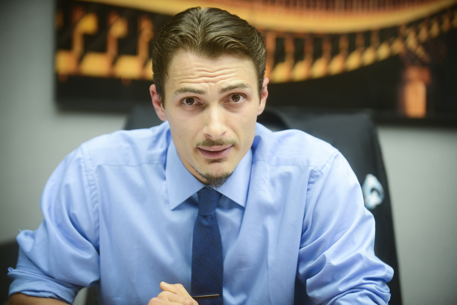Justin Forsman of Vancouver speaks at a Columbian editorial board meeting in July during his unsuccessful campaign for state Senate. Forsman, who has a felony criminal history, intends to file a suit in federal court in an attempt to have his right to own firearms restored.