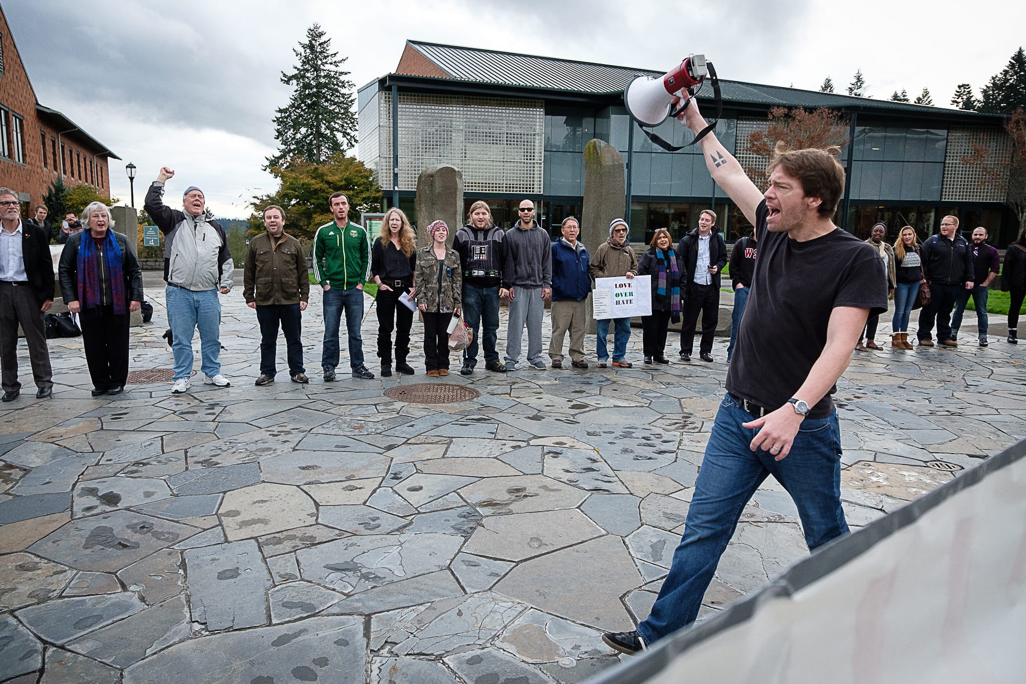 Graduate student Scott Calvert leads a unity rally at the WSU Vancouver campus Thursday.