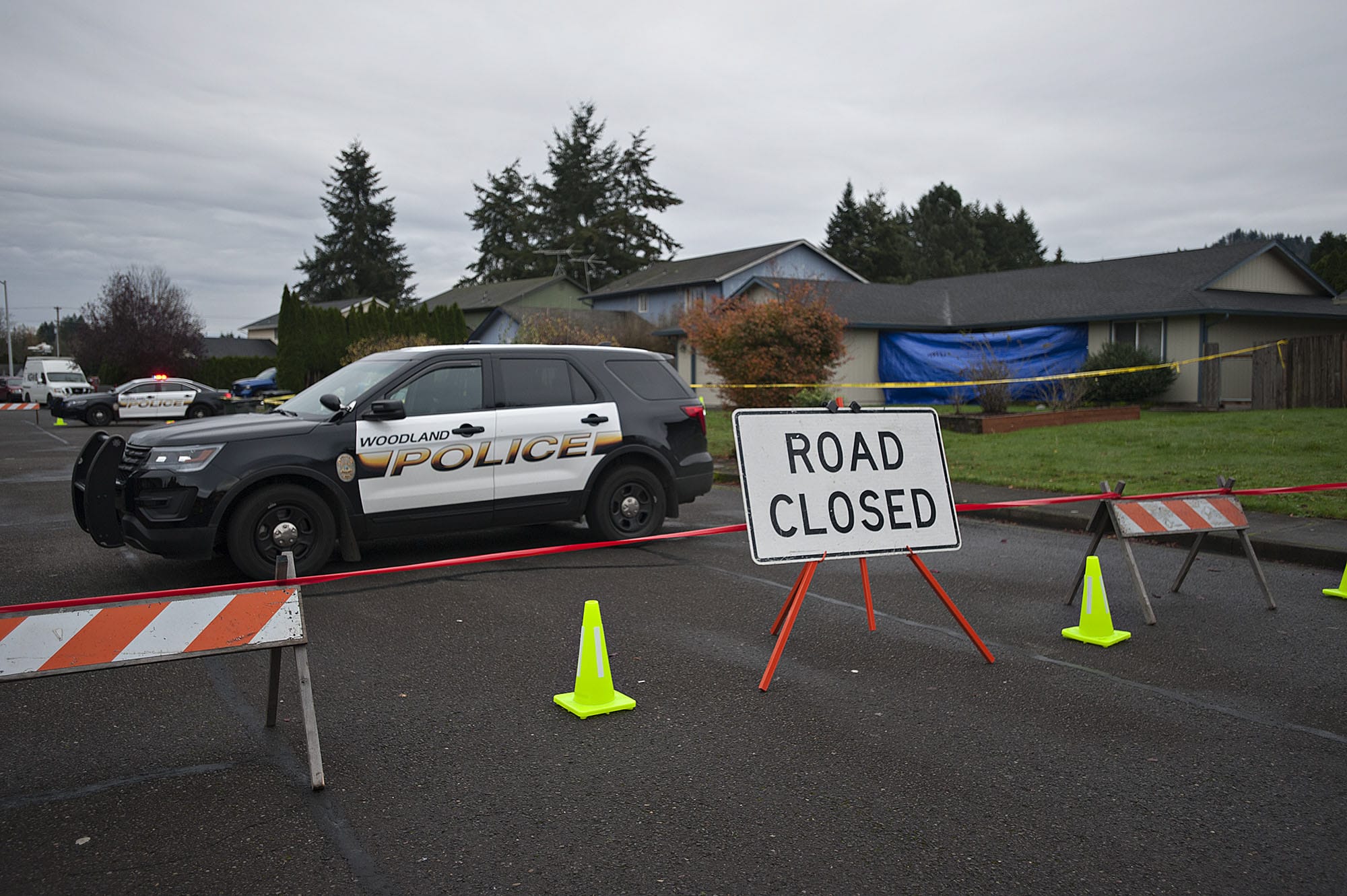 Police close a portion of Dahlia Street in Woodland on Tuesday morning.