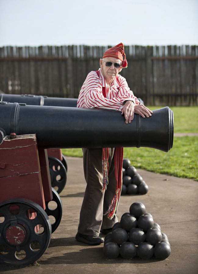 World War II veteran Fred Bridges, dressed in the style of an 1840s Hudson&#039;s Bay company employee, with one of the cannons at the Fort Vancouver National Historic Site. During the Korean War, he was an Army artillery officer with the Cowboy Cannoneers.