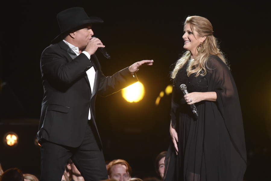 Garth Brooks and Trisha Yearwood perform at the 50th annual CMA Awards on Wednesday in Nashville, Tenn.