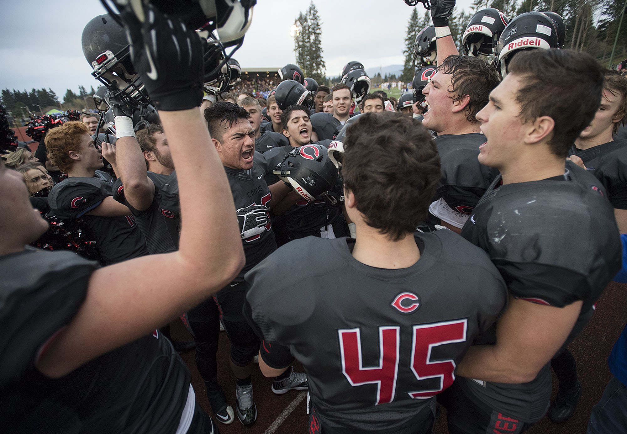 Camas players celebrate their playoff win over Sumner at McKenzie Stadium on Saturday afternoon, Nov. 26, 2016.