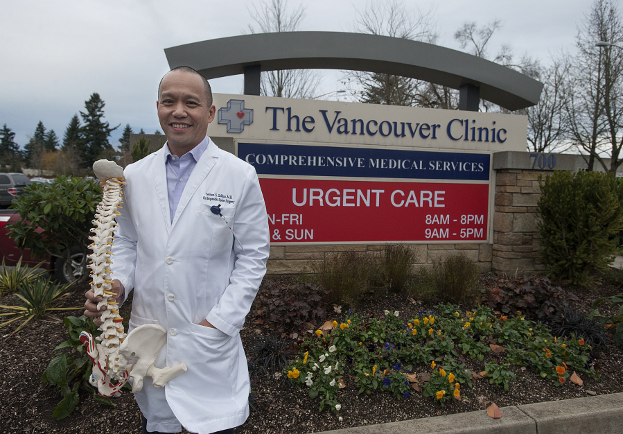 Dr. Nelson Saldua, an orthopedic surgeon with a sub-specialty in spine surgery, came to The Vancouver Clinic in July after a 14-year naval career.