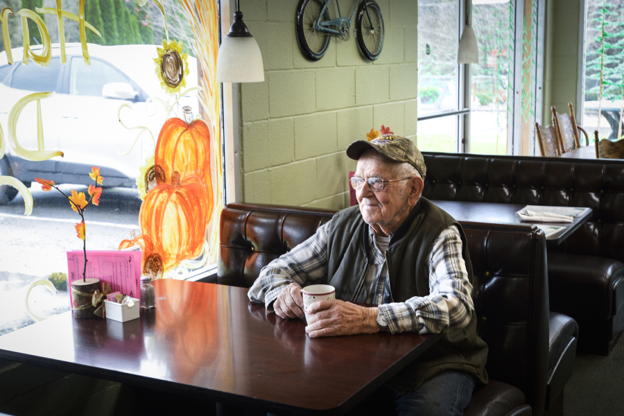 Ernie Fedrick, 88, enjoys a cup of black coffee at the Countree Kitchen & Timbers Saloon in Amboy. Fedrick supported President-elect Donald Trump but hopes the country becomes more unified and cuts back on some of the divisive talk.