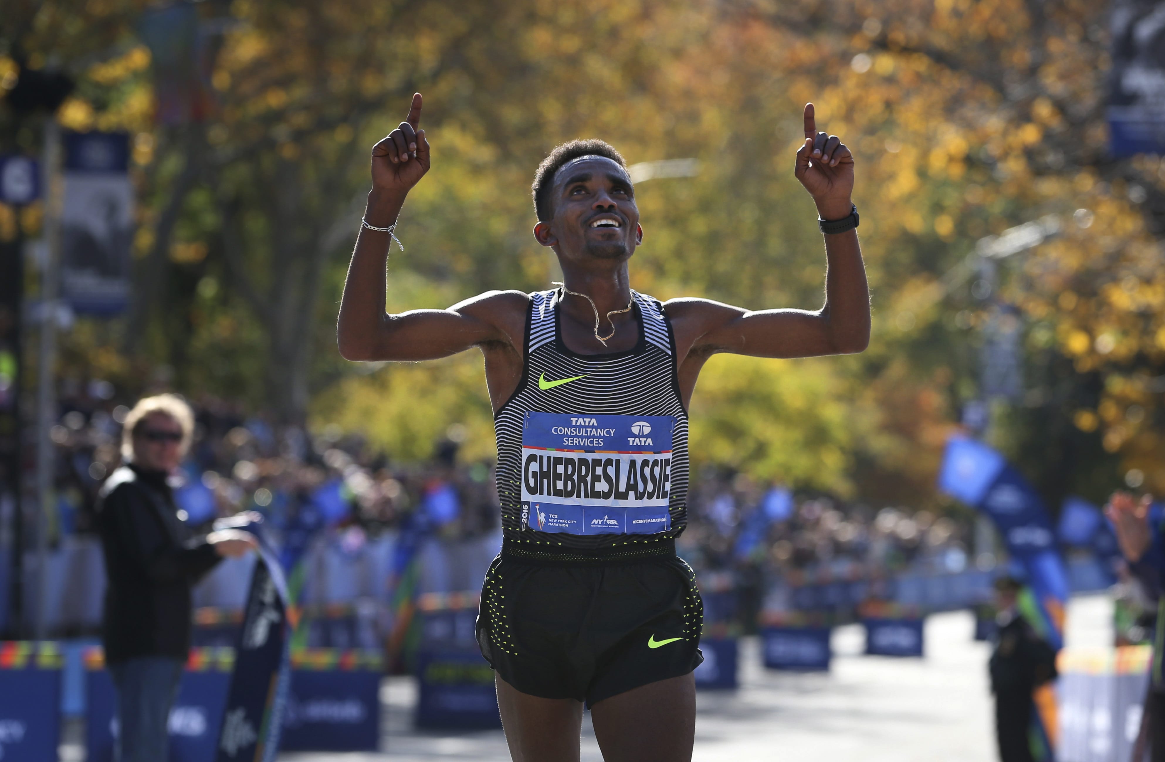 Ghirmay Ghebreslassie, of Eritrea, reacts as he crosses the finish line first in the men's division of the 2016 New York City Marathon in New York, Sunday, Nov. 6, 2016.