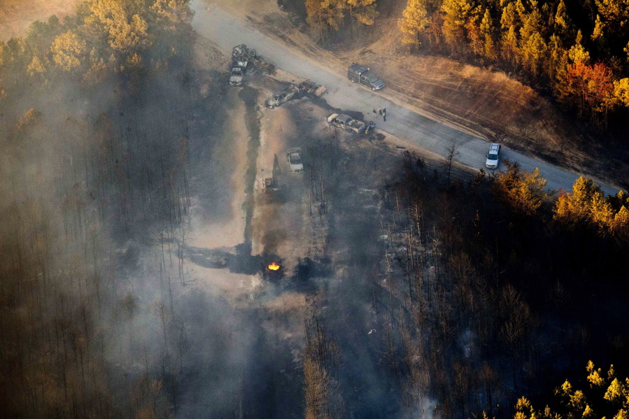 A flame continues to burn after a Monday explosion of a Colonial Pipeline on Tuesday in Helena, Ala. The blast, which sent flames and thick black smoke soaring over the forest, happened about a mile west of where the pipeline ruptured in September, Gov. Robert Bentley said in a statement.
