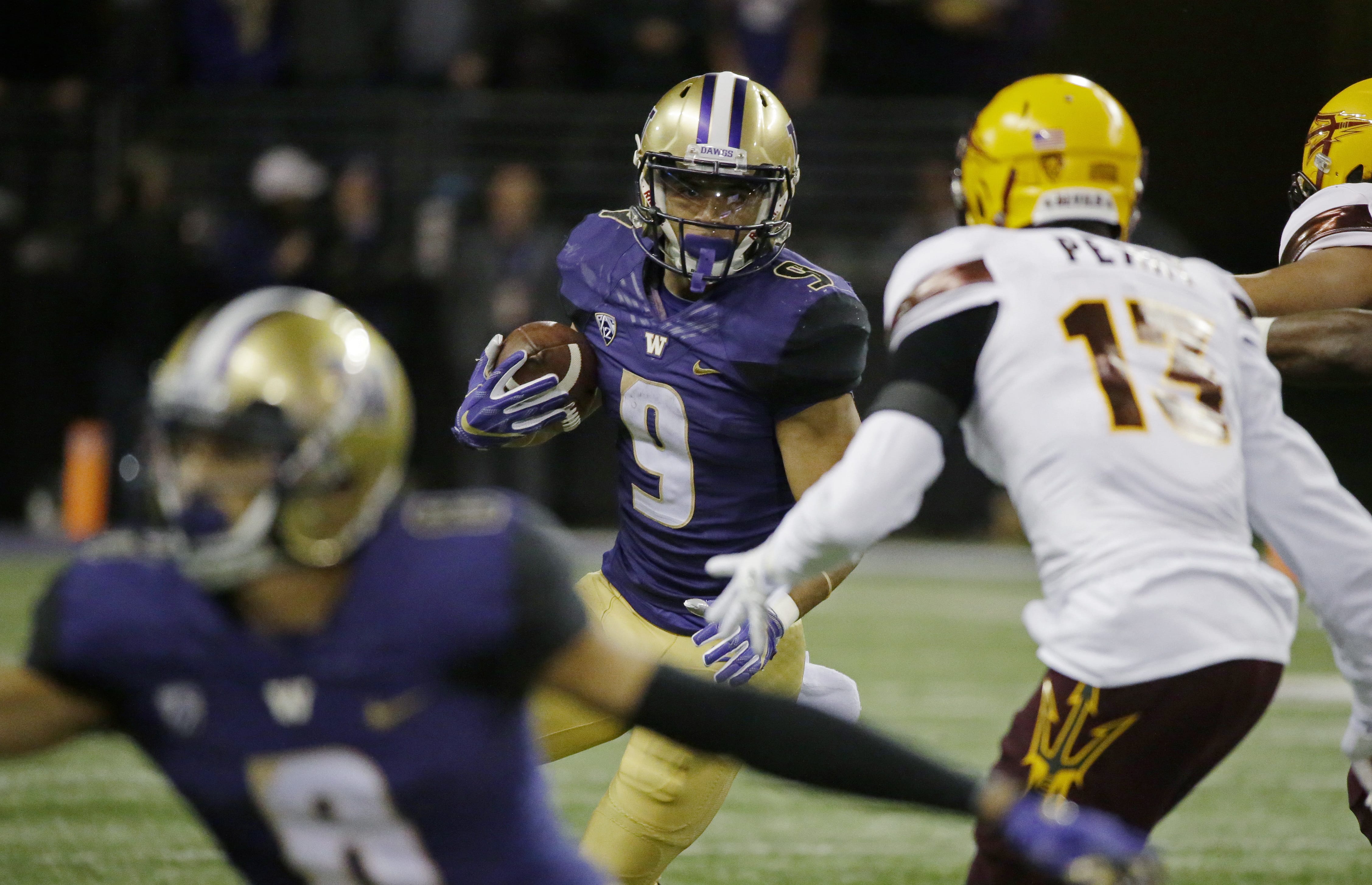 Washington running back Myles Gaskin (9) rushes against Arizona State in the first half of an NCAA college football game, Saturday, Nov. 19, 2016, in Seattle. (AP Photo/Ted S.