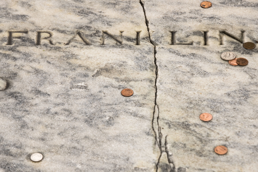 A crack runs through Benjamin Franklin&#039;s gravestone Tuesday in Philadelphia.