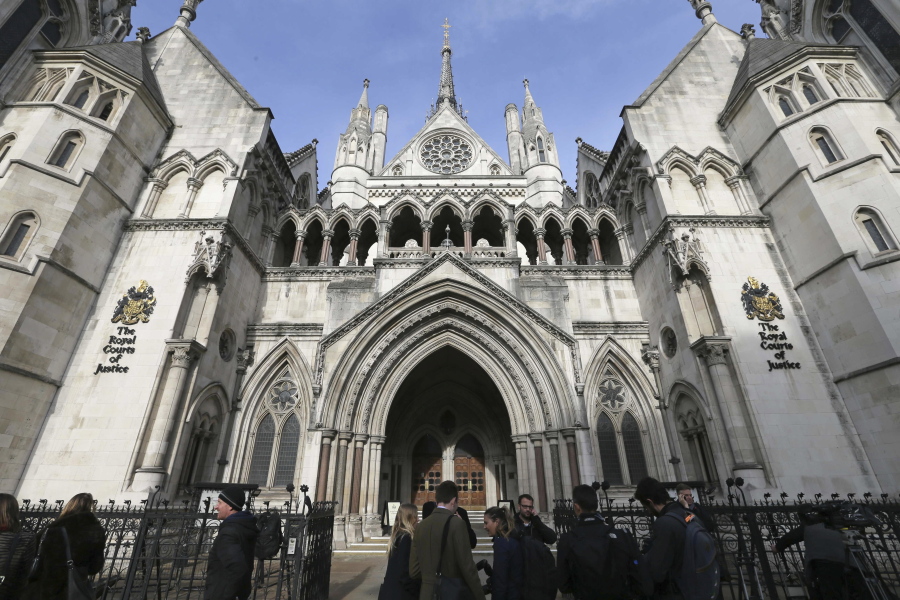 Media gather outside the High Court in London. High Court Judge Peter Jackson has granted the final wishes of a 14-year-old girl to be cryogenically preserved.