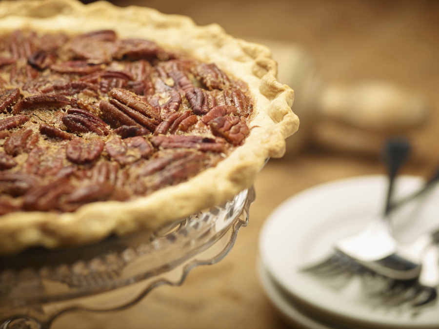 This Oct. 14, 2016 photo provided by The Culinary Institute of America shows pecan pie in Hyde Park, N.Y. This dish is from a recipe by the CIA.