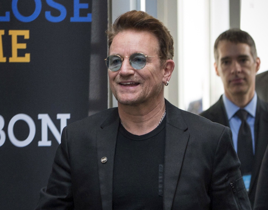 Bono arrives at the Global Fund conference in Montreal in September. Bono will be honored as Glamour magazine's first Man of the Year among the magazine's Women of the Year recipients Nov. 14 in Los Angeles.