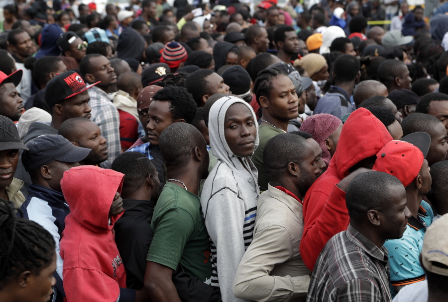 Haitians line up at an immigration agency in Tijuana, Mexico, on Oct. 3 with the hope of gaining an appointment to cross to the U.S. side of the border.