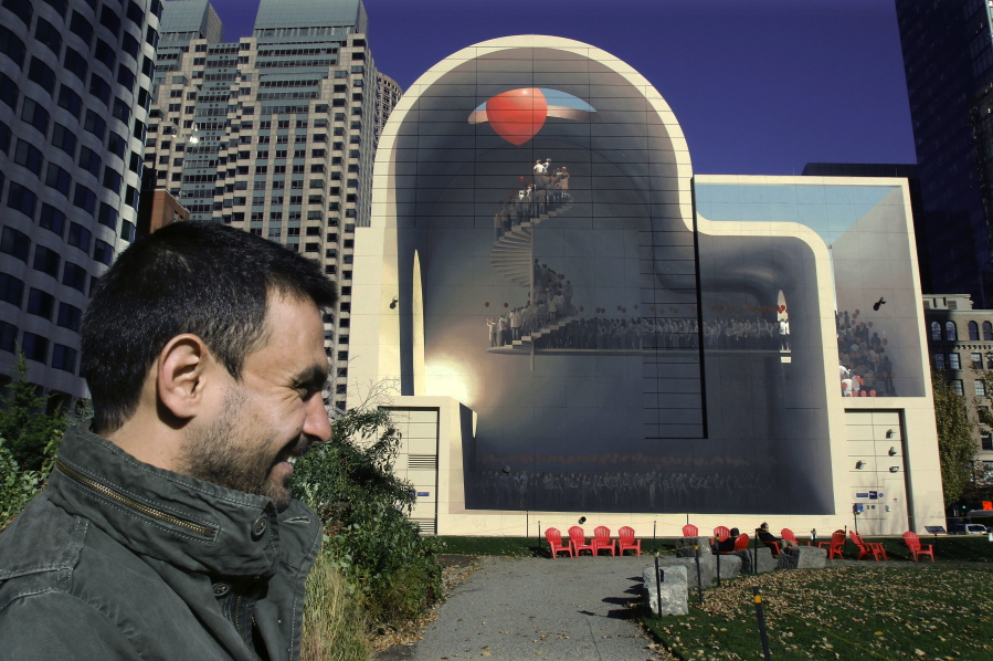 Mehdi Ghadyanloo, from Tehran, Iran, stands beside his mural, &quot;Spaces of Hope,&quot; on Nov. 11 on the Rose Kennedy Greenway in Boston. The mural artwork is a stunning expression of optimism he hopes can lead to better understanding between the peoples of the two nations.