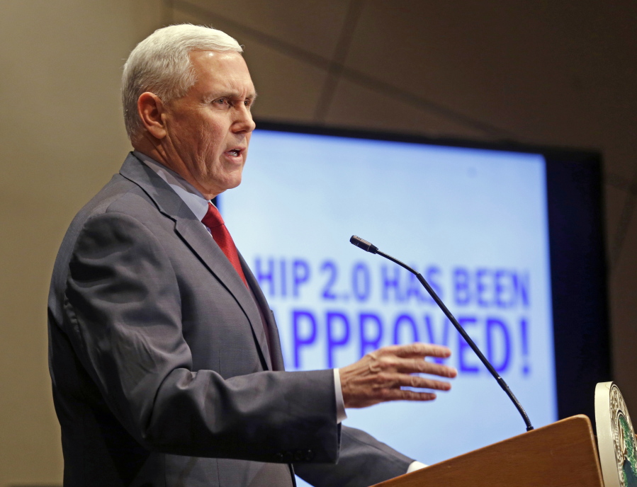 FILE - In this Jan. 27, 2015, file photo, Indiana Republican Gov. Mike Pence announces that the Centers for Medicaid and Medicare Services had approved the state&#039;s waiver request, called HIP 2.0, during a speech in Indianapolis. Pence told Republican governors meeting in Florida on Nov. 14, 2016, that Donald Trump would replace traditional Medicaid funding to states with block grants that ???encourage innovation that better delivers health care to eligible residents,??? according to a statement from the Trump transition team.
