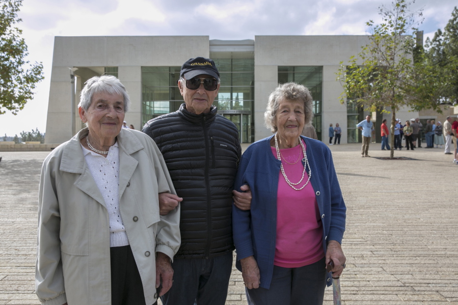 From left, Sonja Sternberg, Thomas Jacobson and Gisela Feldman, passengers on the SS St. Louis trans-Atlantic liner in 1939, visit the Yad Vashem Holocaust memorial on Thursday in Jerusalem. The St. Louis was carrying Jewish refugees from Nazi Germany and was rejected by the United States and Cuba.